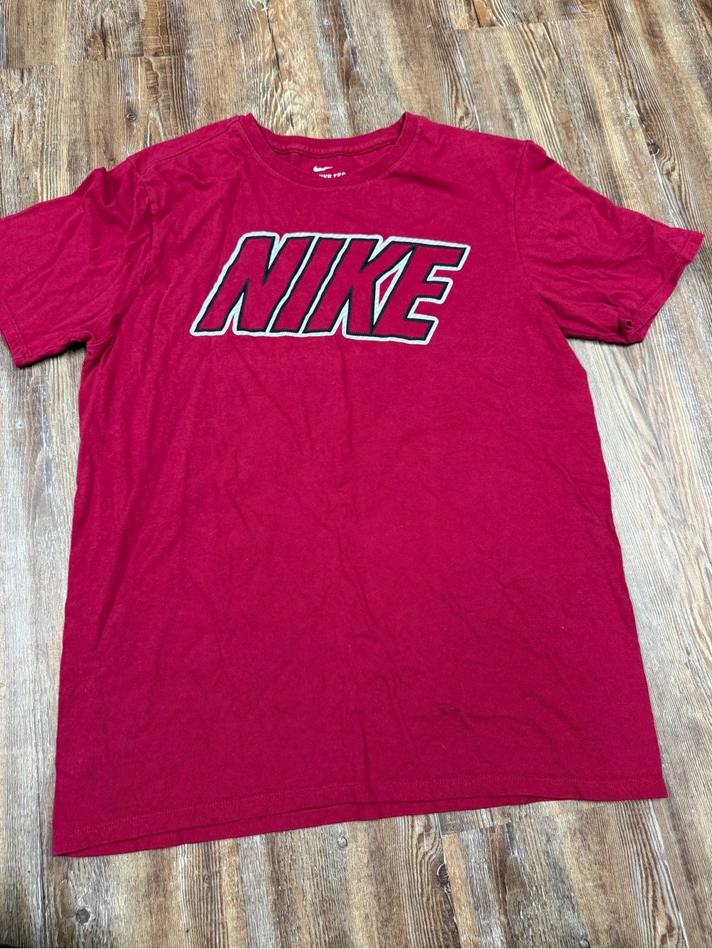 Vintsge y2k Nike t-shirt with white Nike logo, size M